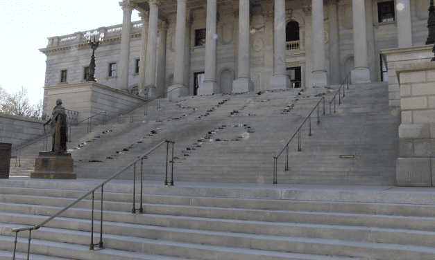 Advocates for the disabled gather at the State House