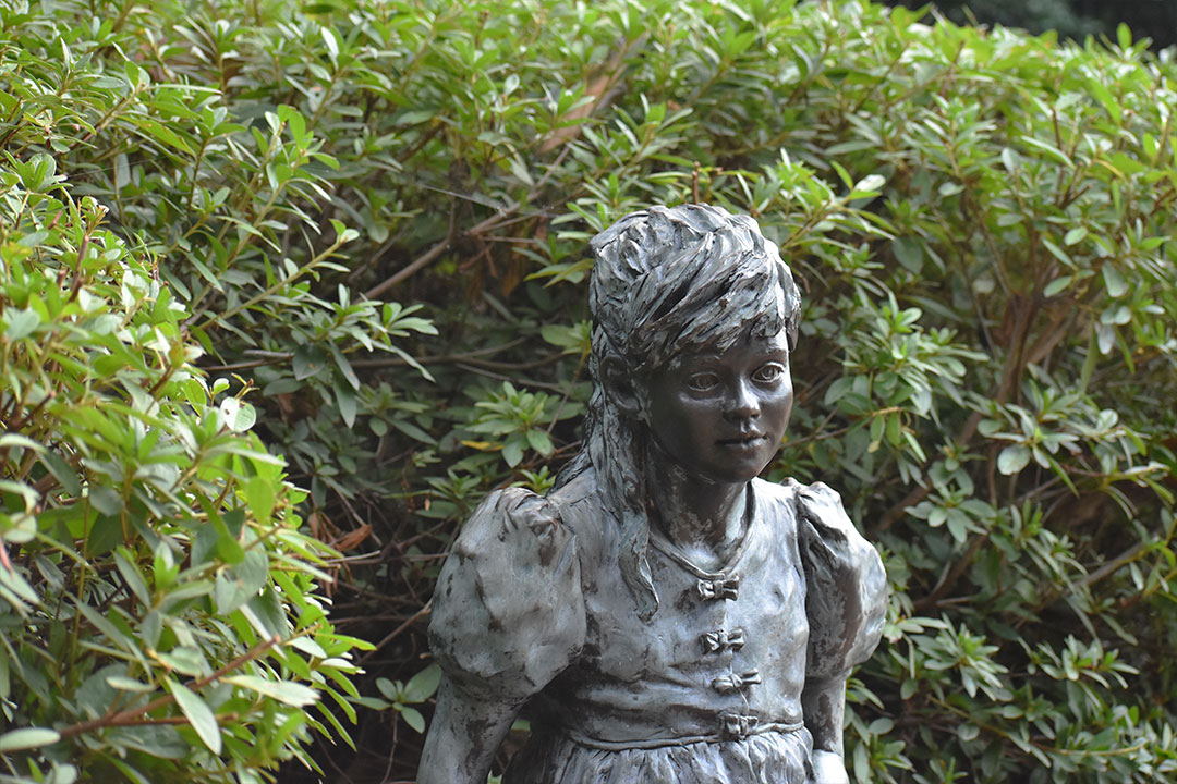 a statue in the garden
