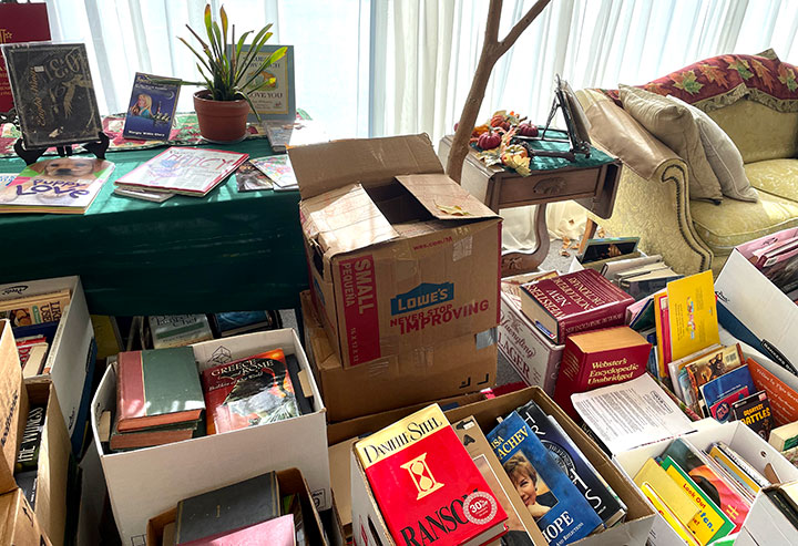Overflowing supply of donated books at The Book Dispensary