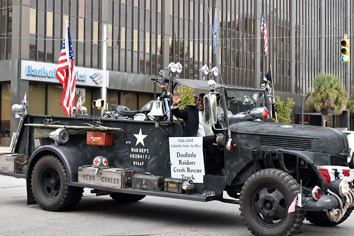 A picture of Columbia Mayor Steve Benjamin in an army vehicle