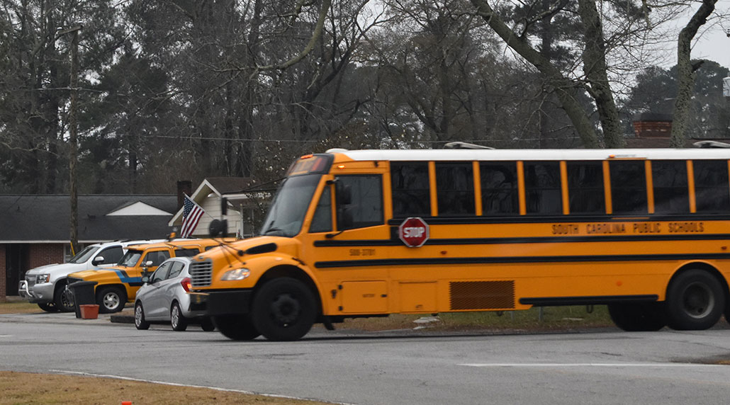 House approves doubling fines for passing a stopped school bus