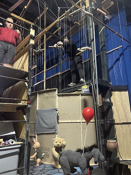 A photo of the backstage of the Columbia Marionette Theatre.
