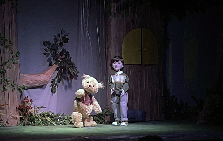 A photo of Winnie the Pooh and Christopher Robin at the Columbia Marionette Theatre.