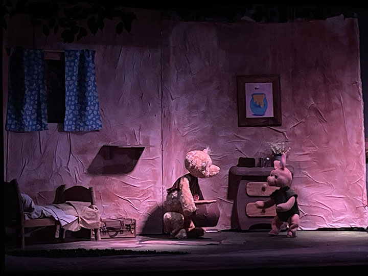 A photo of Winnie the Pooh and Piglet at the Columbia Marionette Theatre
