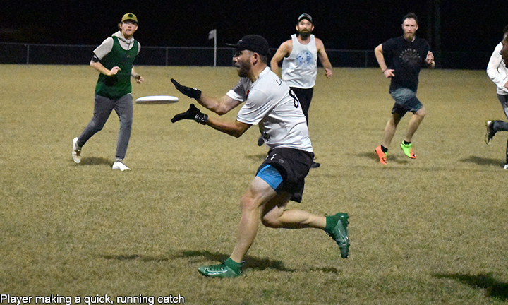 Photo of running catch in ultimate frisbee game