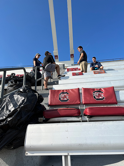 Who cleans up USC’s stadium after gameday? Future military officers, that’s who