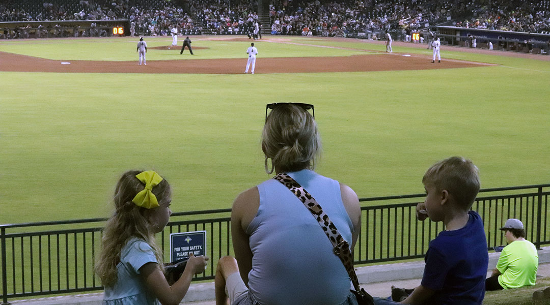 Pitchers, popcorn and pints: Fans gather for Fireflies opening night