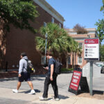 USC parking filled to brim, overflowing onto nearby streets