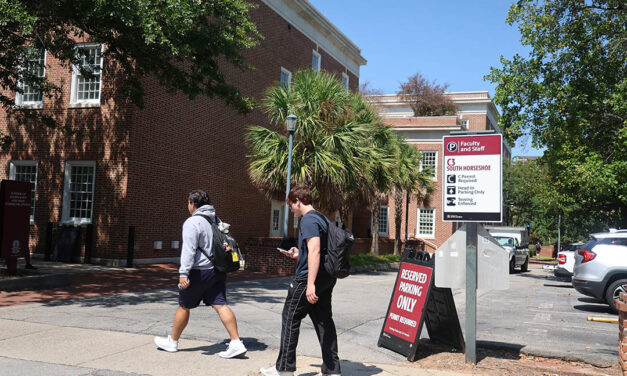 USC parking filled to brim, overflowing onto nearby streets