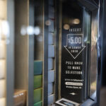 A retired cigarette vending machine now sells art at the Moxy Marriott