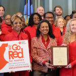 City Hall goes red to fight the state’s leading killer