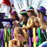 A ‘community full of love’ in purple, green and gold