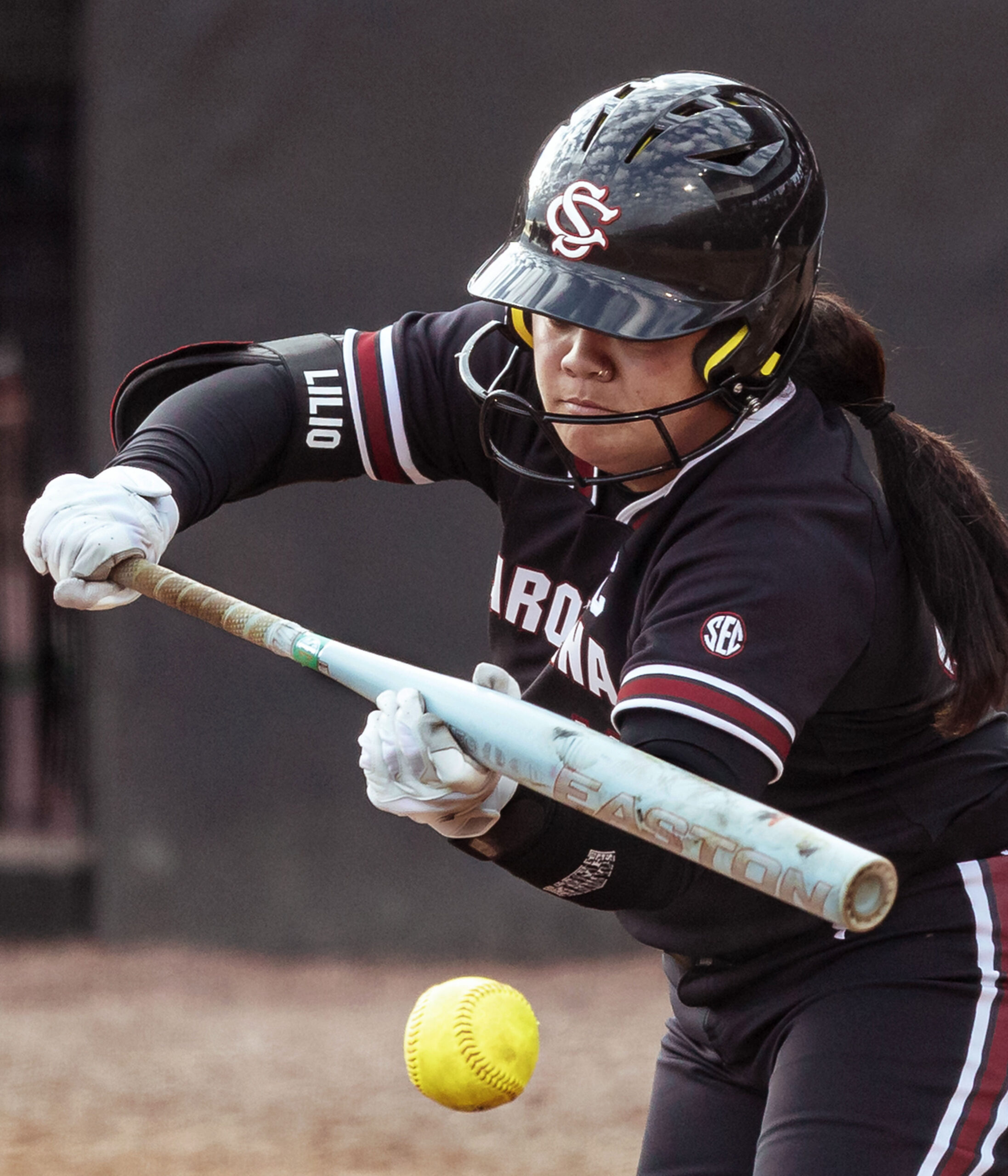A player bunts the ball. 